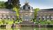 The front facade of the orangery and surrounding gardens with pond of the Hermitage in Bayreuth 