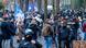 Police stand between anti-lockdown protesters and counter-demonstrators in Bremen, Germany