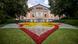 The front facade and gardens of the Bayreuth Festspielhaus theater