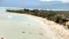 A long beach on a peninsula on the island of Lagkawi.