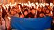 Budapest activist hold candles and a Ukraine flag